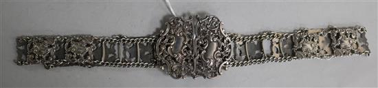 An Edwardian pierced silver belt by E.S. Barnsley & Co, Birmingham, 1902, 69cm.